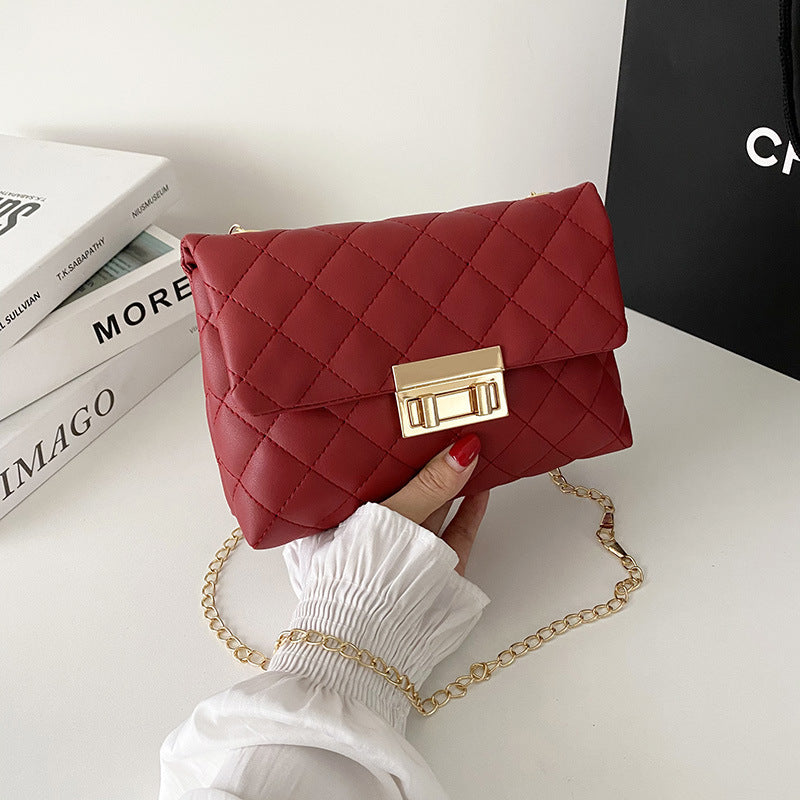 Damen-Tasche mit Drehverschluss und Diamant-Plaid-Stickerei