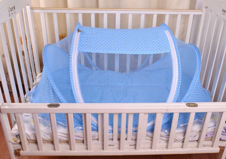 Faltbares Babybettnetz mit Kissen