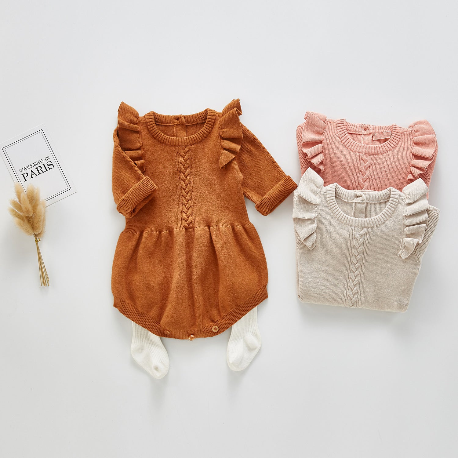 Gestrickte Baby-Einteilerkleidung