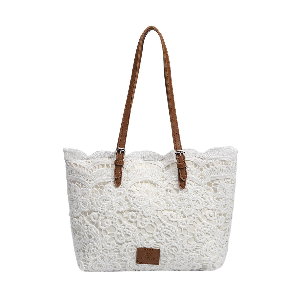 Weisse Spitzenhandtasche