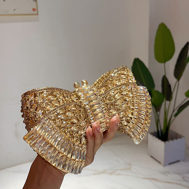 Modische Clutch mit Metallschleife und Umhängetasche