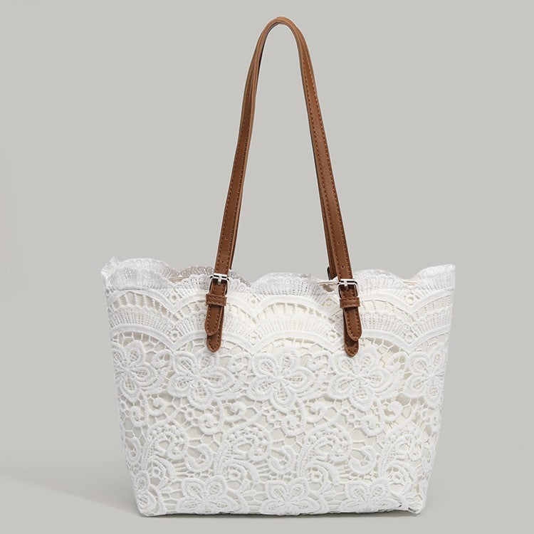 Weisse Spitzenhandtasche