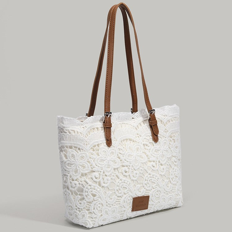 Weisse Spitzenhandtasche