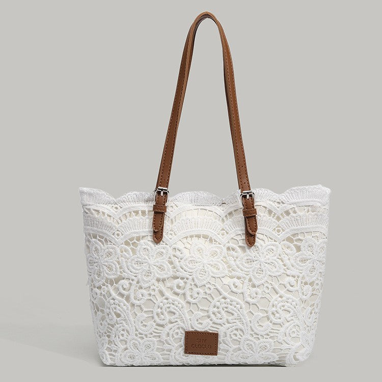 Weisse Spitzenhandtasche